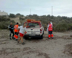 Cruz Roja, Aguilas, rescue bather being battered against the rocks